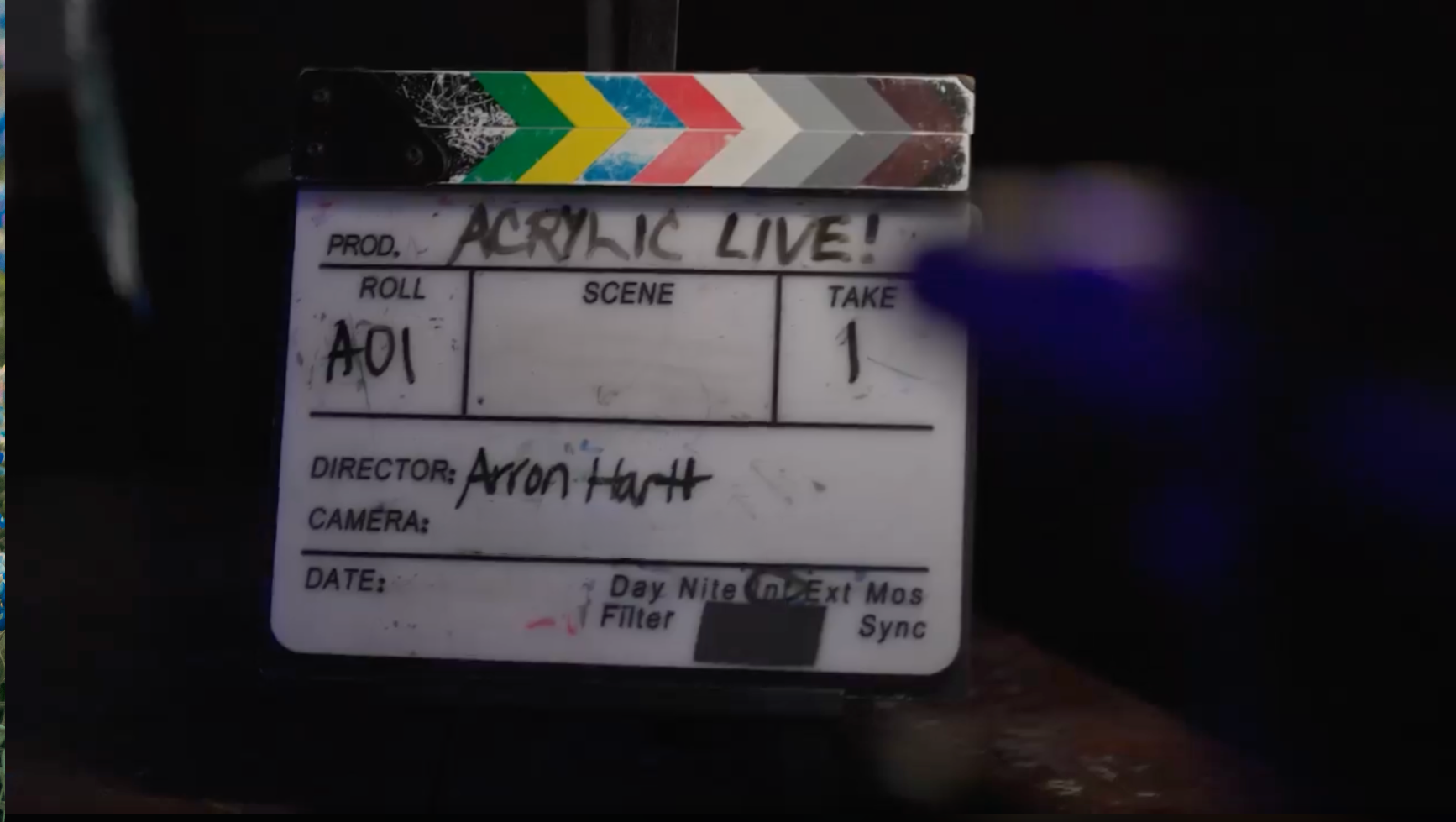 Acrylic Live production slate naming Arron Hartt as director